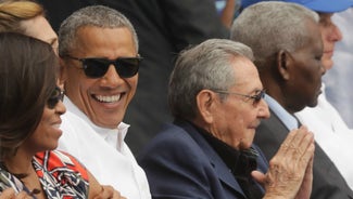 Next Story Image: President Obama did the wave with Cuban president Raul Castro